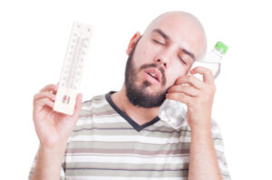 Vigilant Man Hot Home Temperature Shutterstock 302916845 E1530284150214